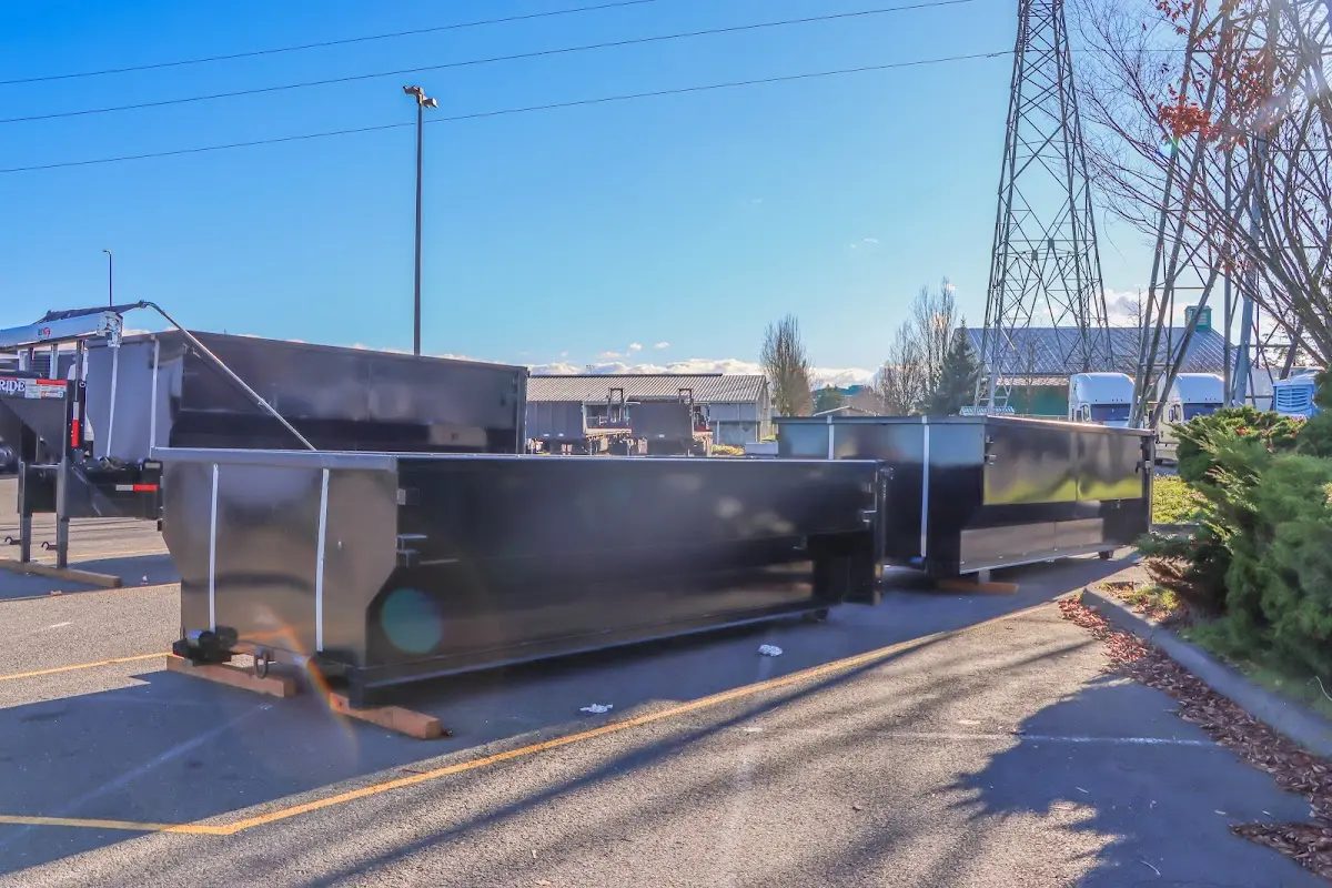 Roll-off dumpster ready for waste disposal at job site for Commercial Dumpster Rental in Lyons